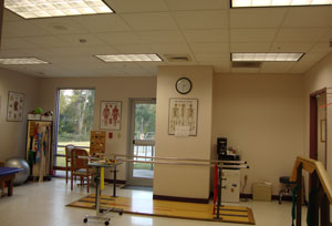Interior image of rehabilitation room with helpful equipment.